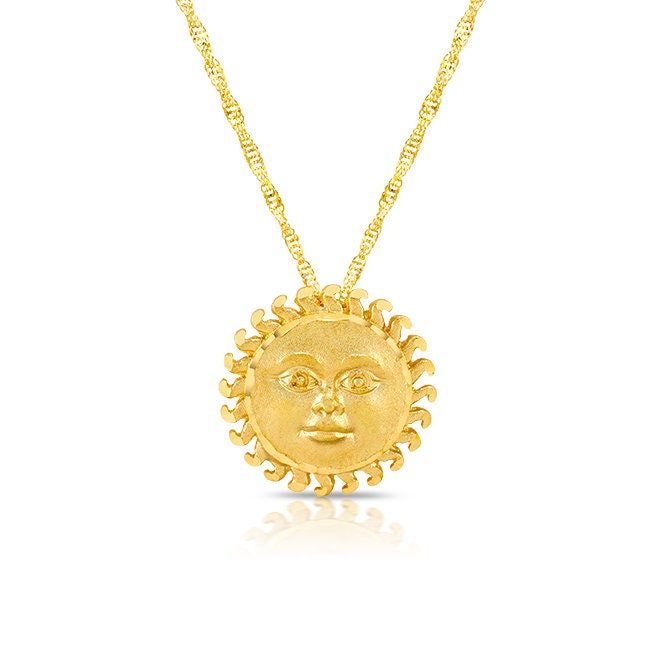 14k solid gold sun pendant on 18" solid gold chain.